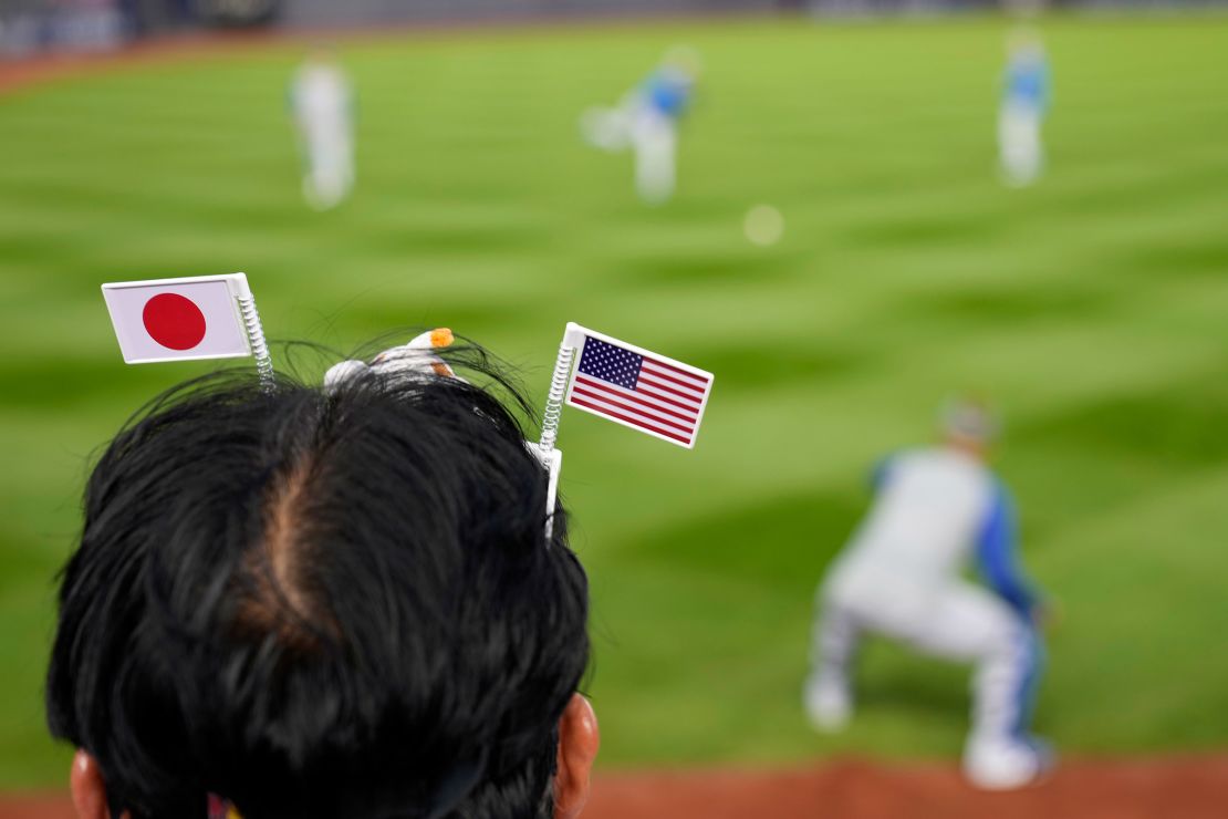 Tomoyuki Masuda, from Kyoto, Japan, watches the Los Angeles Dodgers batting practice before Game 4 of the baseball World Series against the New York Yankees, in New York, on October 29, 2024.