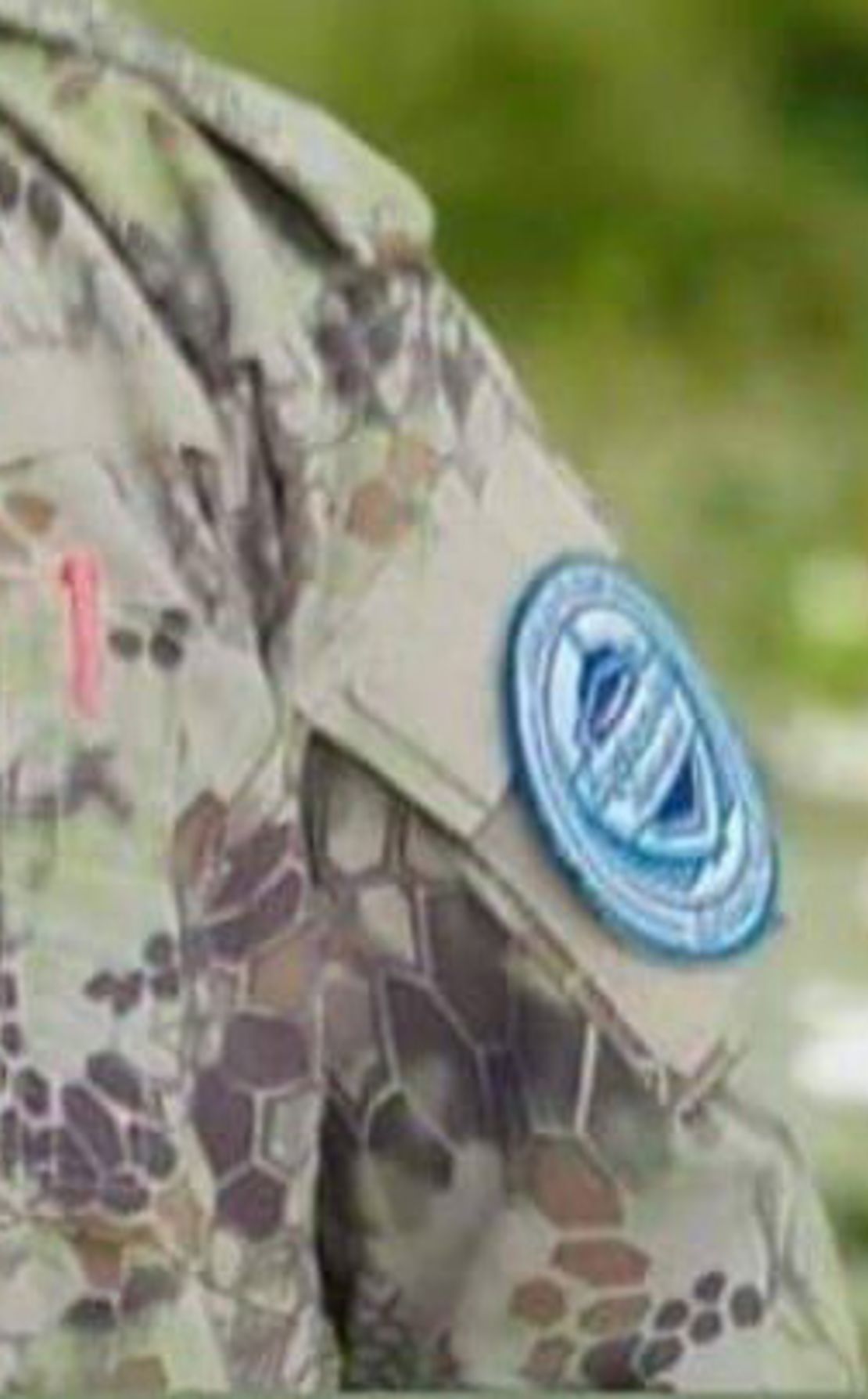 In his Facebook profile picture, the fighter is seen in fatigues embroidered with what appears to be HTS insignia.