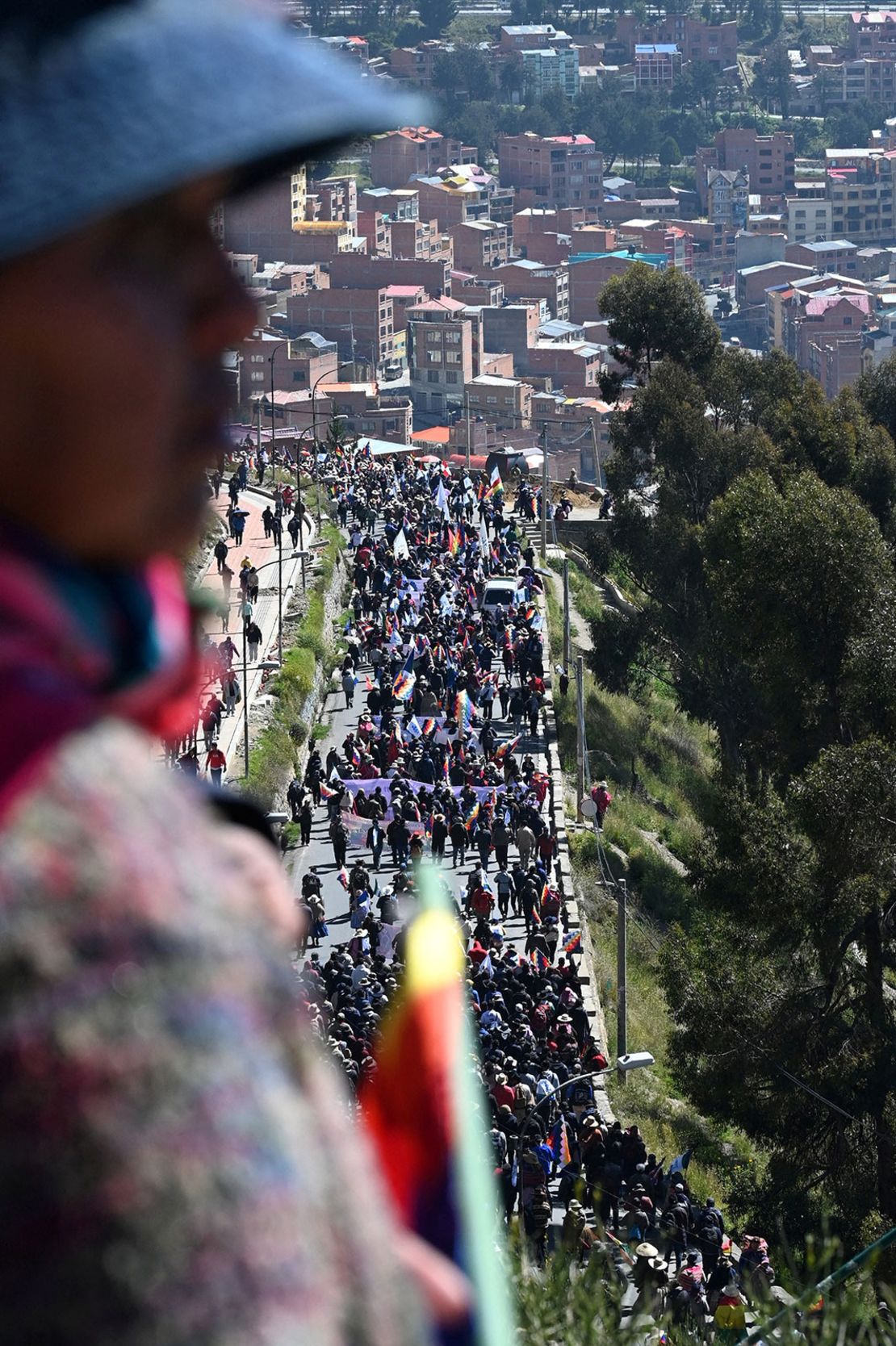 Demonstrators march to Bolivia's electoral authority.