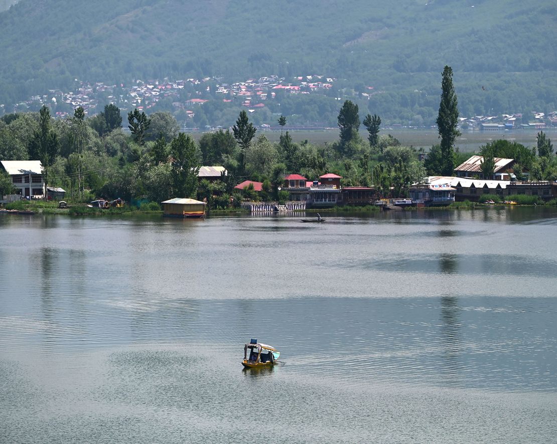 A boatman on the waters of Dal Lake on May 12, 2025 in Srinagar, India-administered Kashmir.